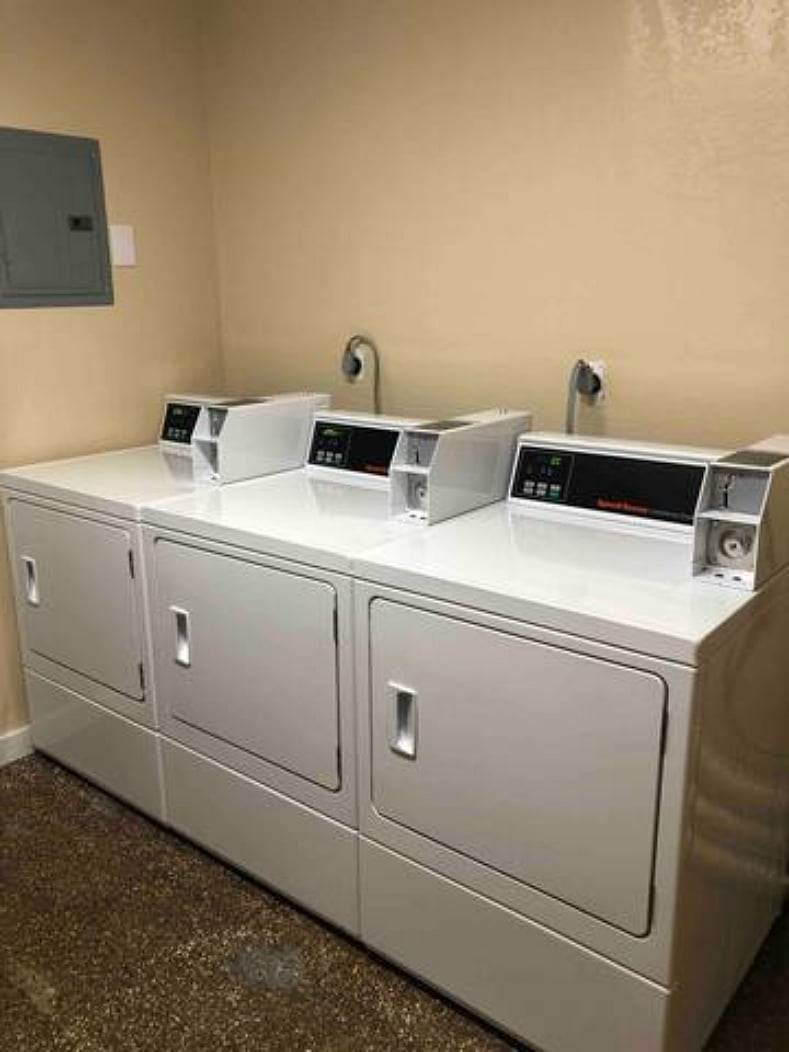 Washer and dryer available in building, just a few steps from the front door. Coins needed.
