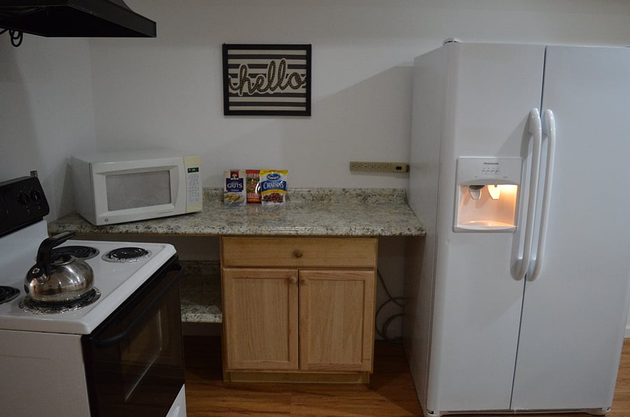 electric stove with hooded exhaust fan, ice maker refrigerator & microwave