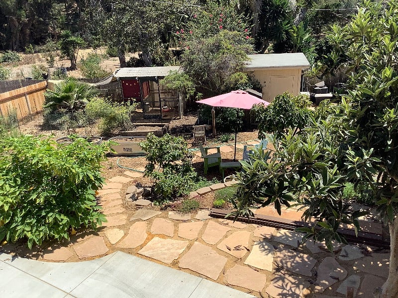 yard view below living room deck