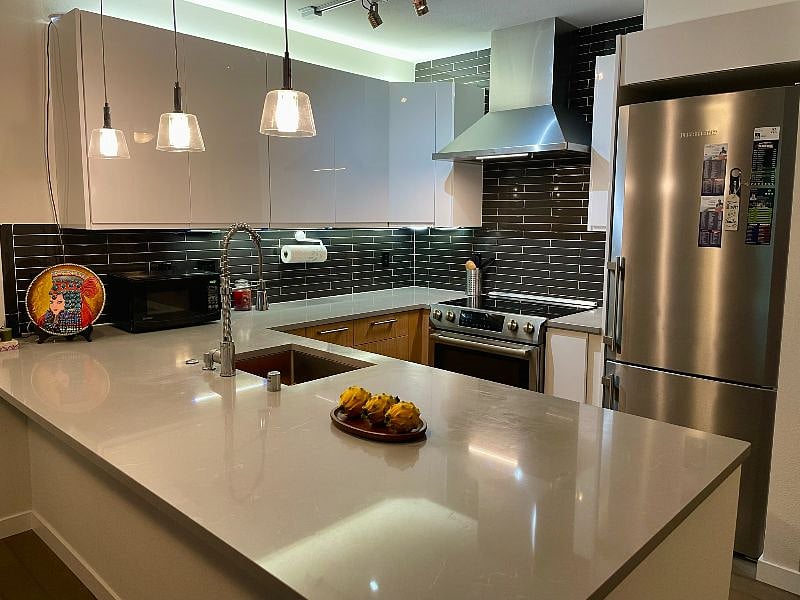 Fully stocked kitchen with designer appliances