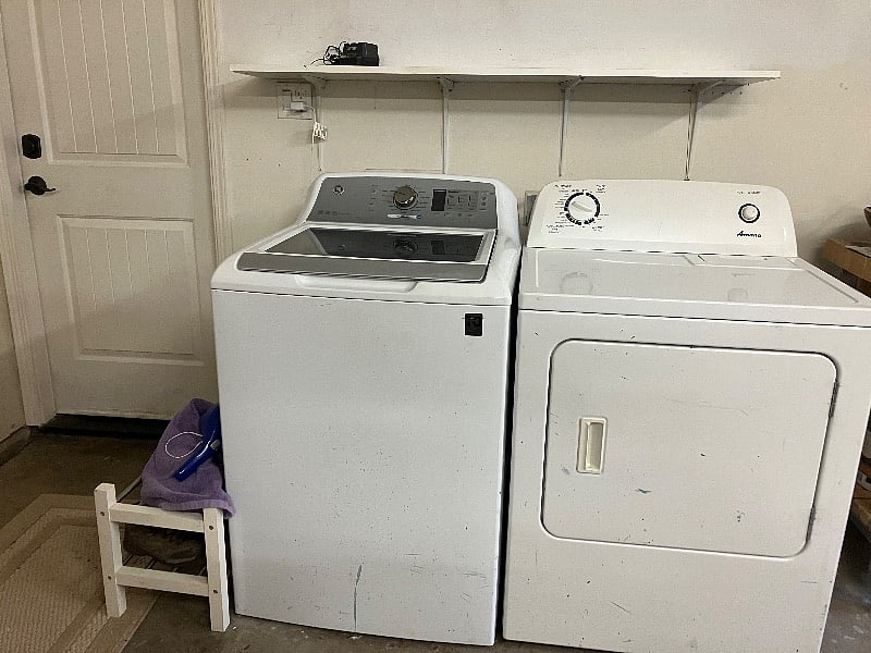 Washer and Dryer are in the garage area and can be accessed by a side door outside.