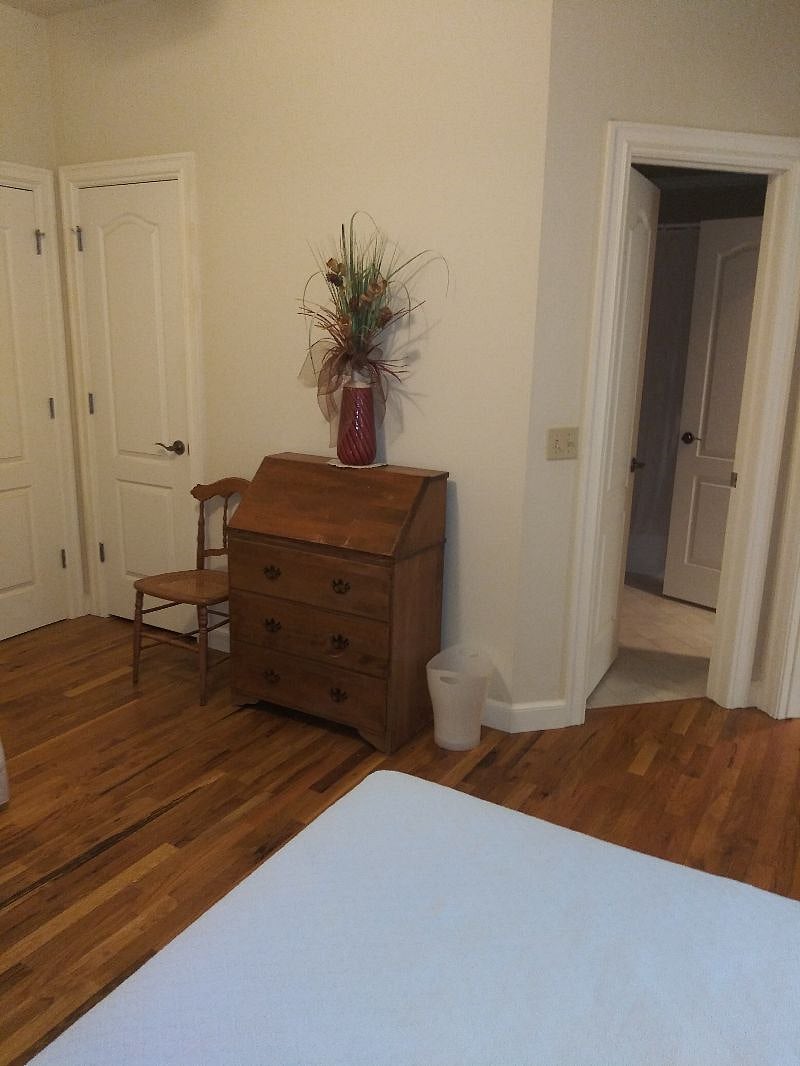 Full bedroom desk and bath entry