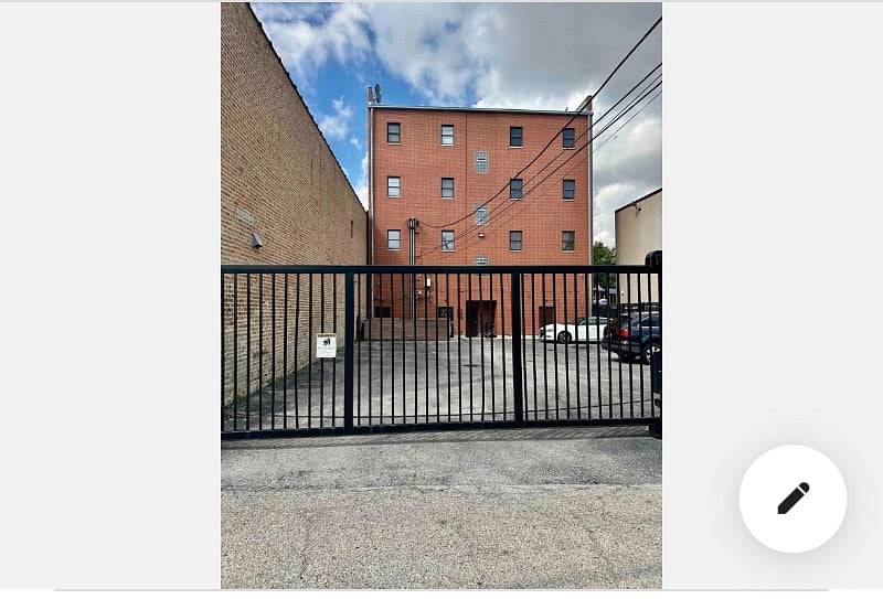 Back of the building with private remote gate.
