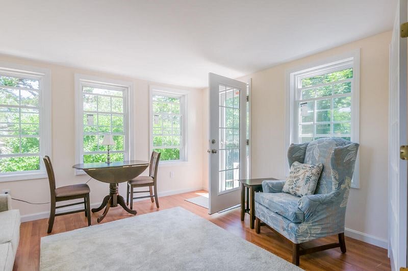 Four-season sunroom overlooking private backyard