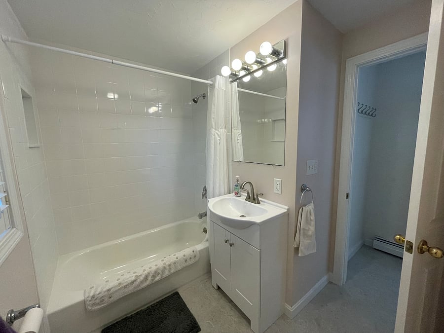 First floor newly rennovated full bathroom adjoining downstairs bedroom