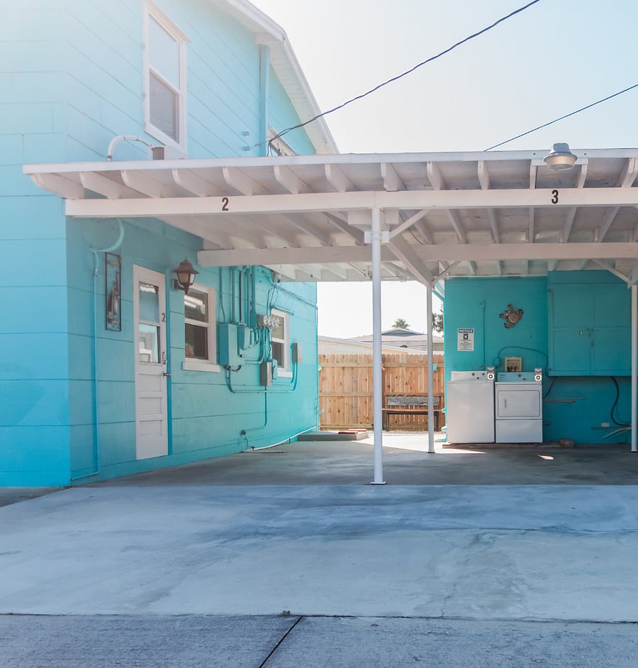 2 car tandem parking. One carport covered other open.