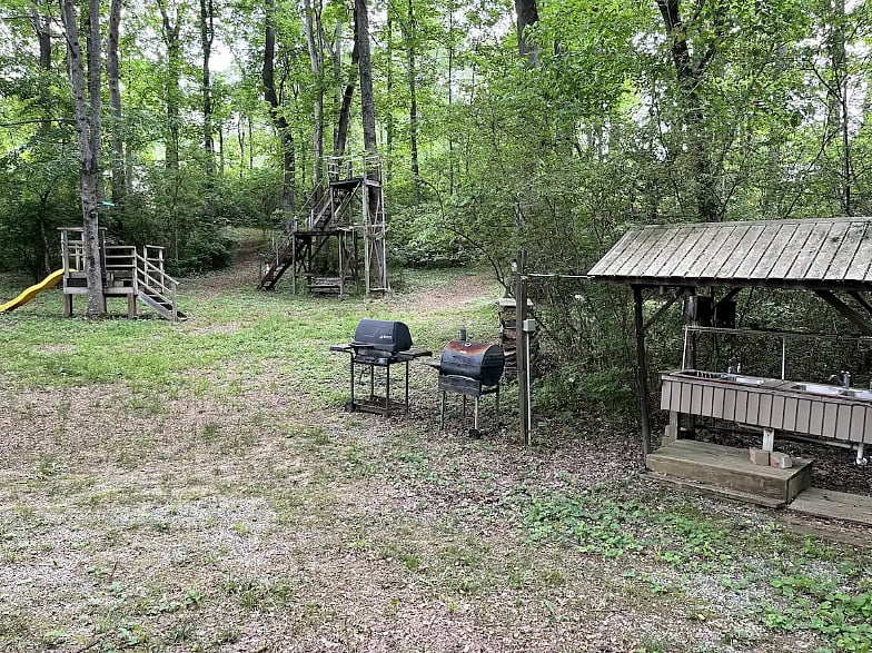 Enjoy our common area with a zip line, fire pit, covered picnic tables, grill, outdoor sink station, swings, and playground!