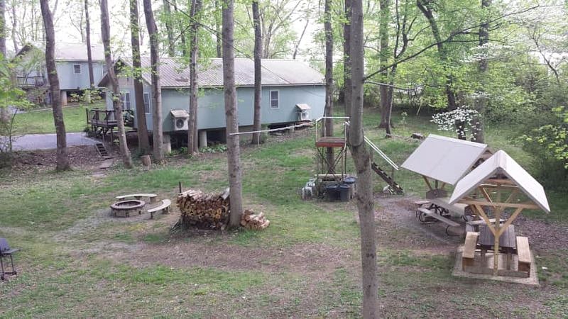 Enjoy our common area with a zip line, fire pit, covered picnic tables, grill, outdoor sink station, swings, and playground!