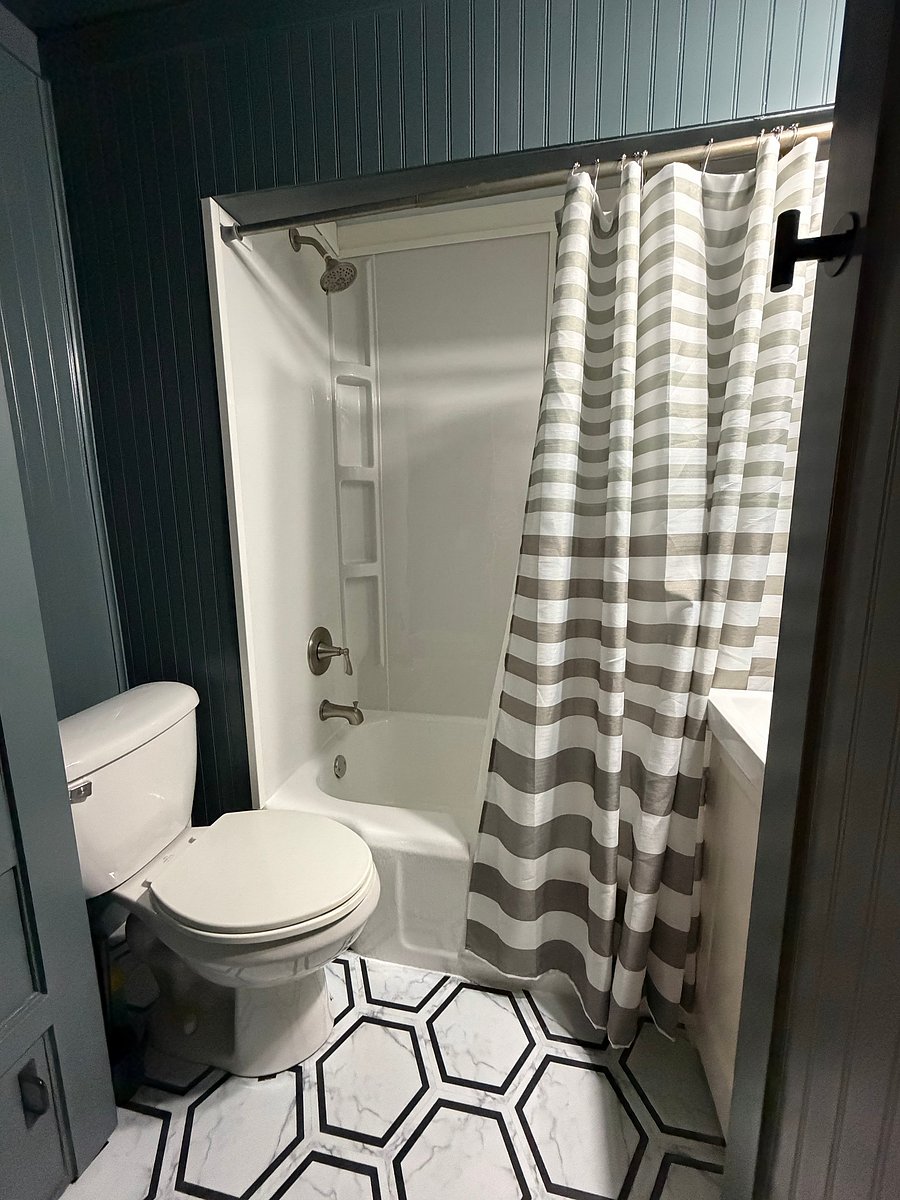 Full bathroom with tub