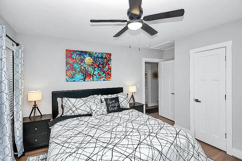 Master Bedroom with King Bed, Blackout Curtains, Smart TV with Roku, Night Stand with Charging Station, closet with Hangers.and Luggage Rack.