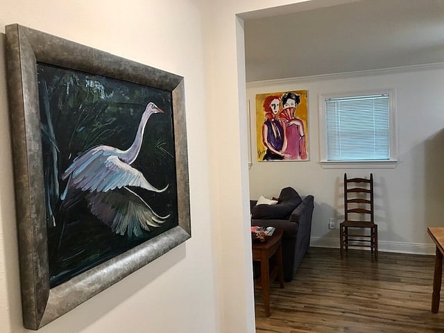 Original artwork adorns the walls of the Wide Oaks Flat.