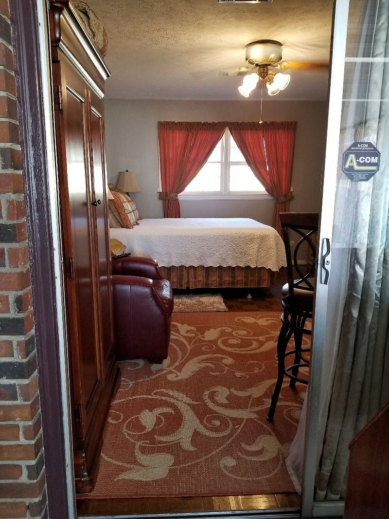 Sliding door with lock and key entrance from inside screened patio.