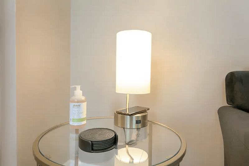 Lamp with wireless charging pad