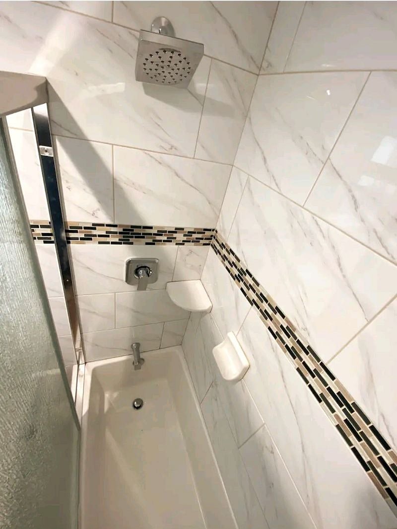Full-size Bathtub & Rainfall Shower.