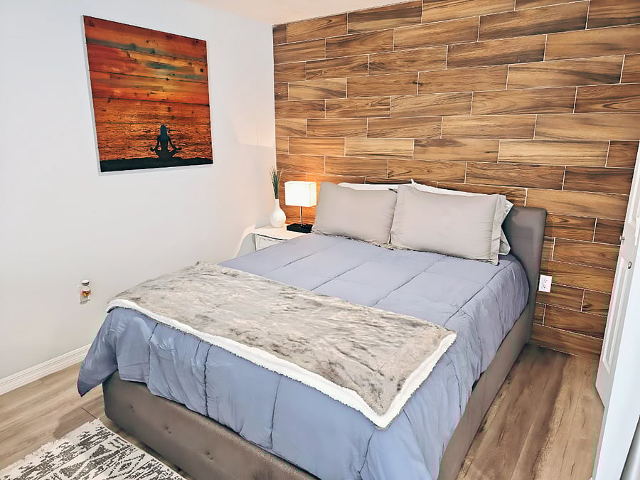 Cozy queen sized bed for high quality sleep.