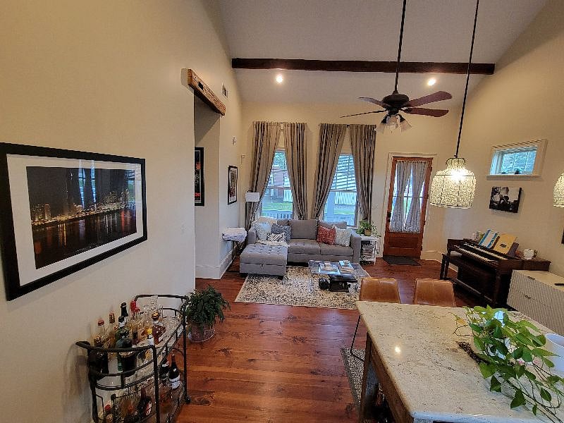 Living room with L sofa and plenty light