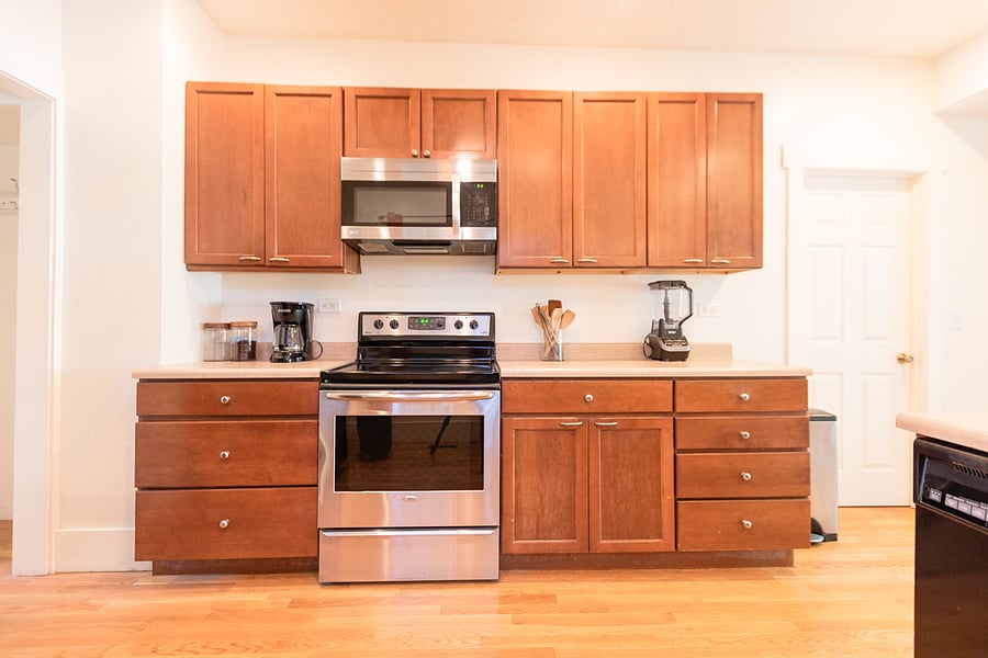 Large kitchen stocked with everything you need for a home cooked meal.