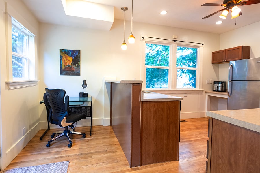 Full size work station desk and comfortable office chair.