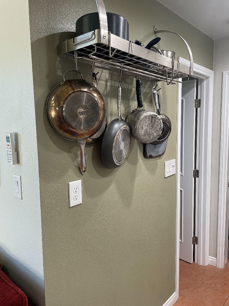 Plenty of kitchen pots and pans.