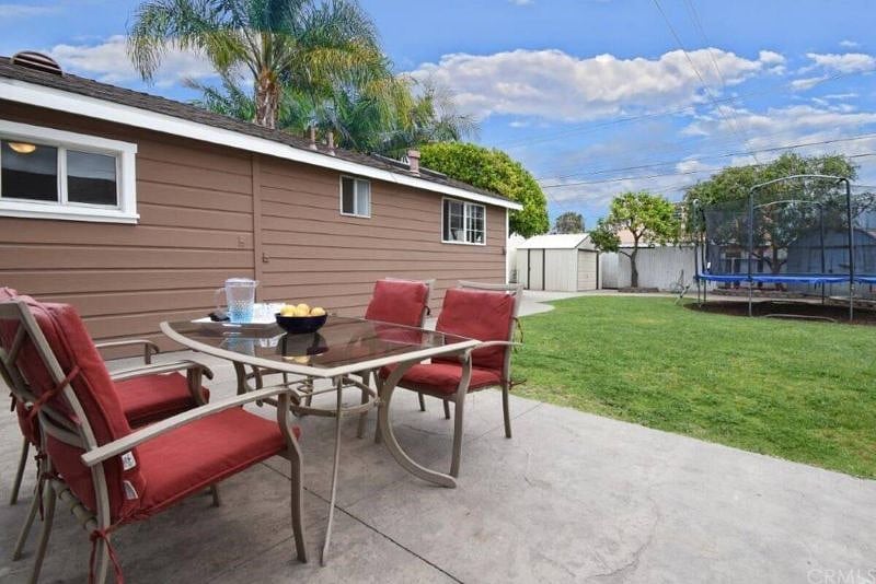 another table/sitting area in the back yard.