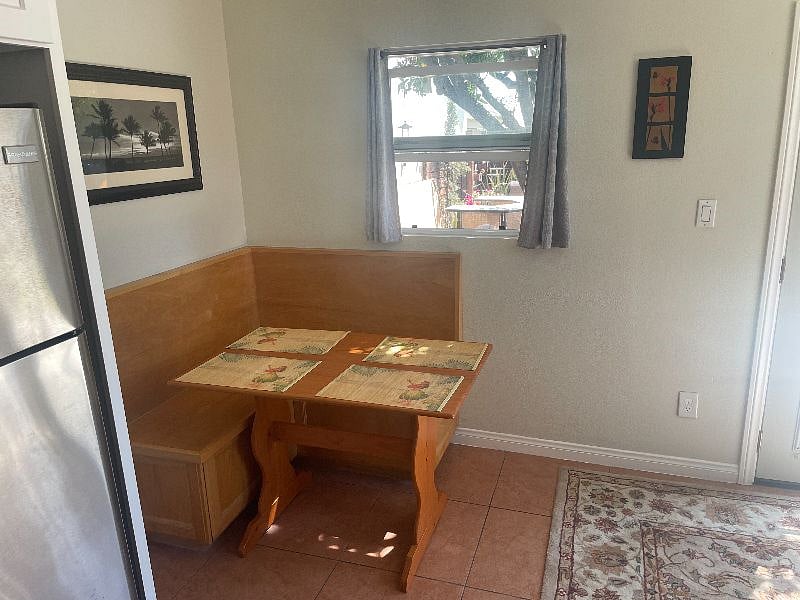 Breakfast nook dining area is bright and cozy.