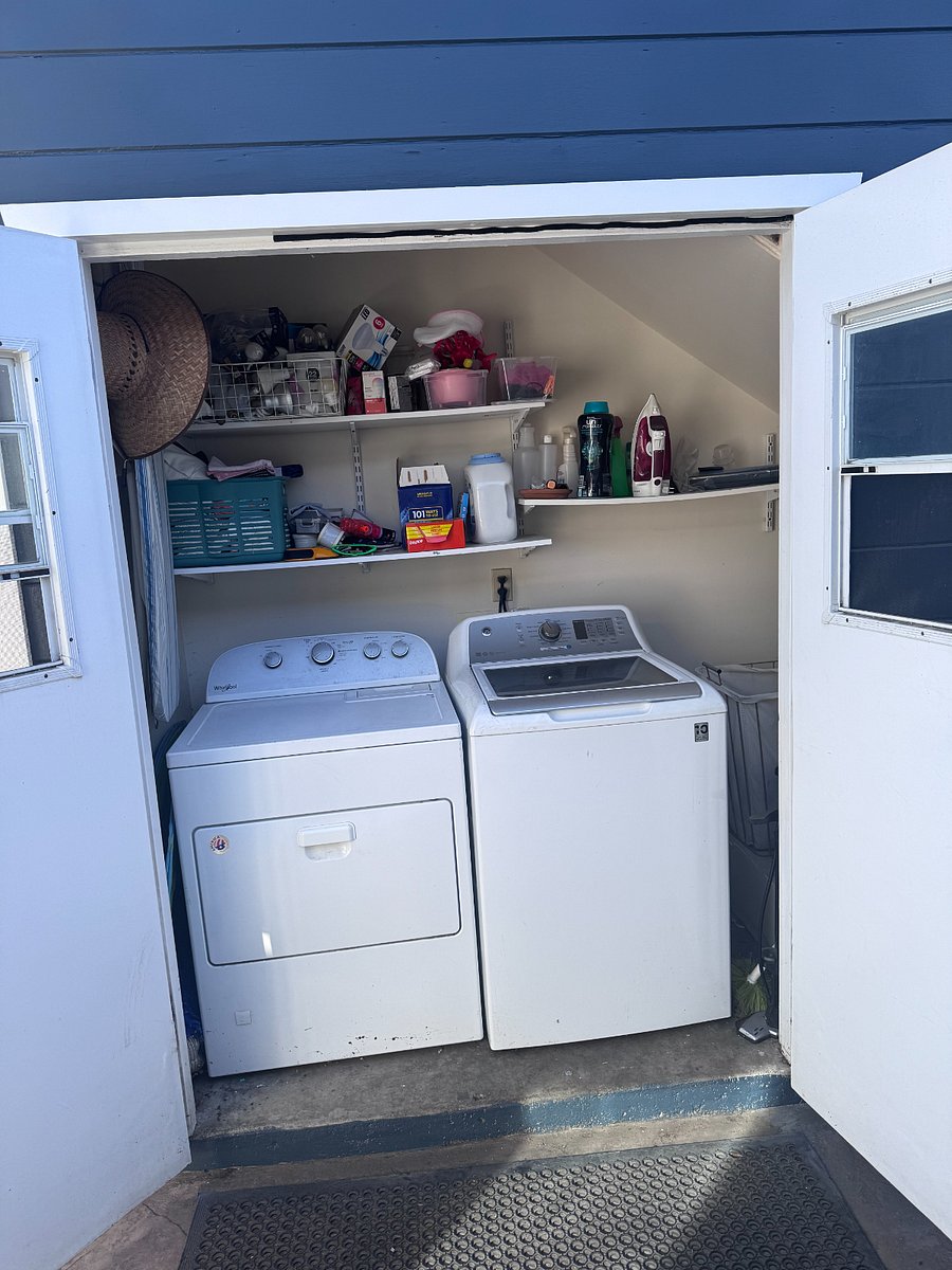 Laundry machines located in the shared walkway, for your convenience.