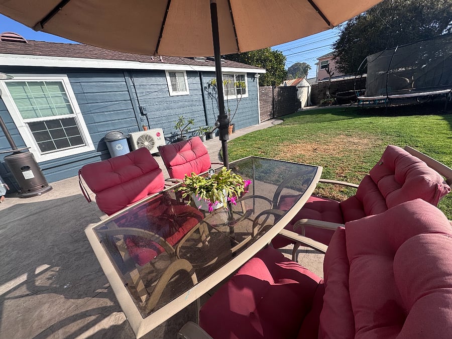 another table/sitting area in the back yard.