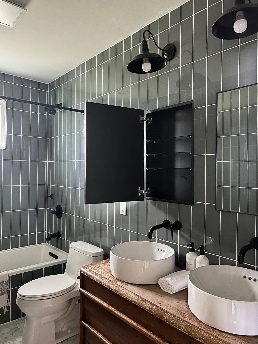 The bathroom mirrors are medicine cabinets!