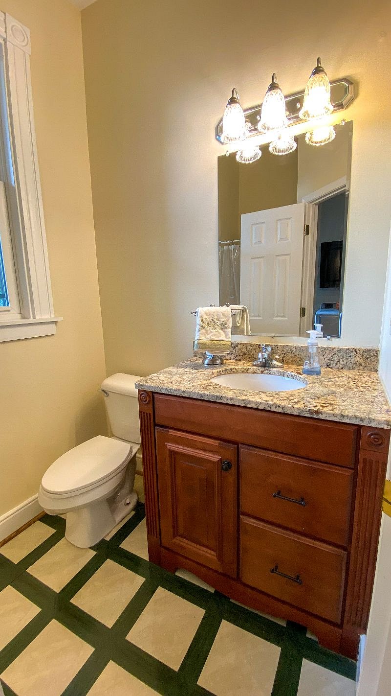 Downstairs bathroom with shower.
