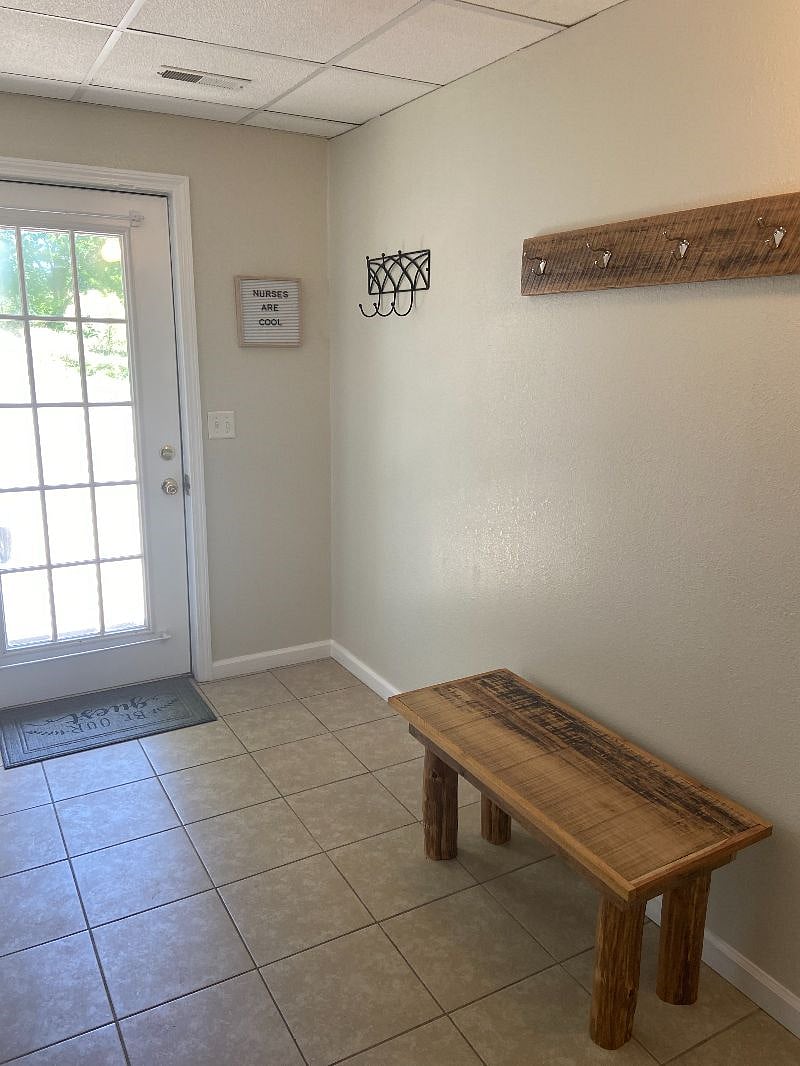 Nice wide entry way with bench.