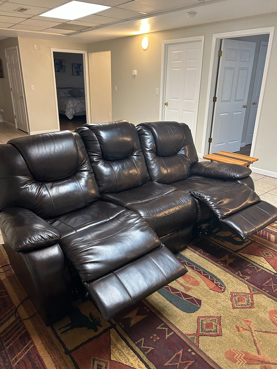 Come kick back in the electric recliner after a long day on your feet!