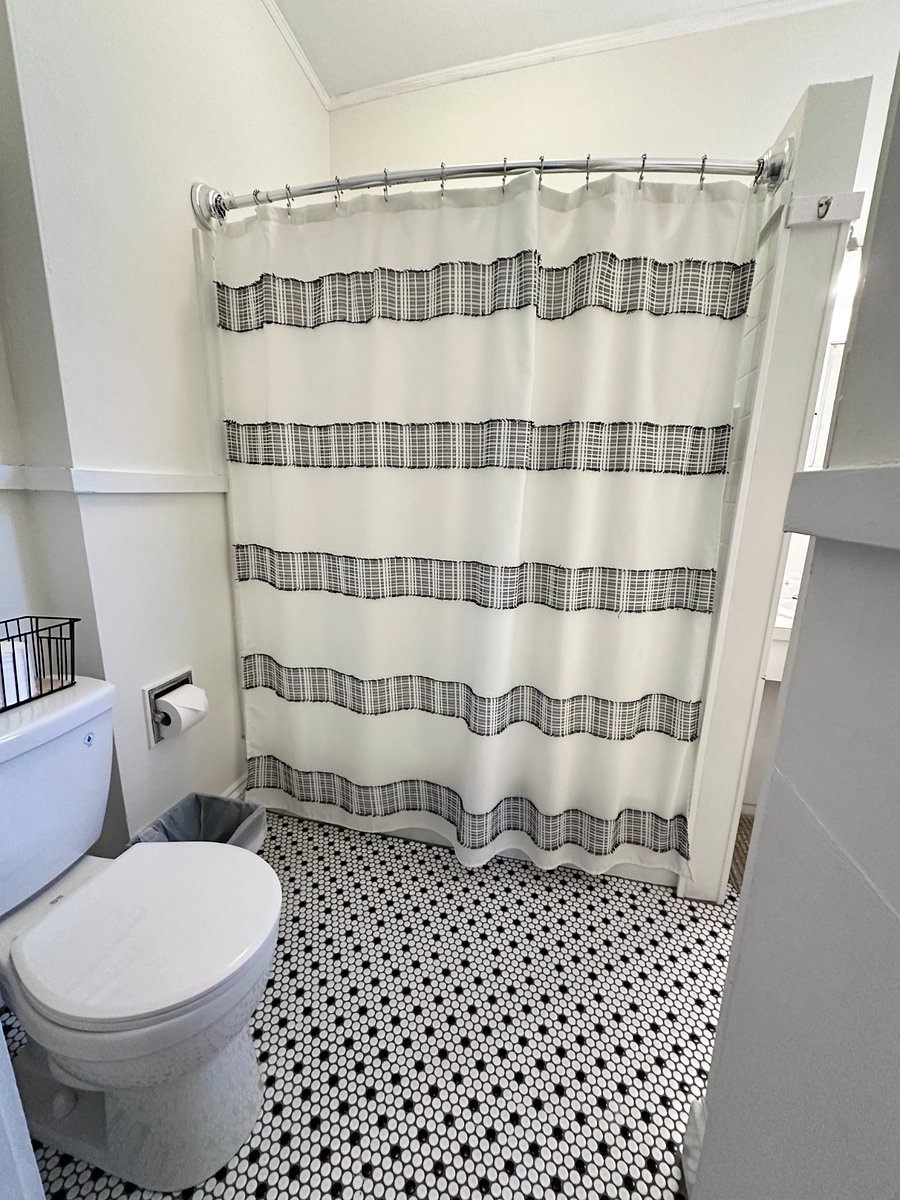 Full bath with shower and tub.