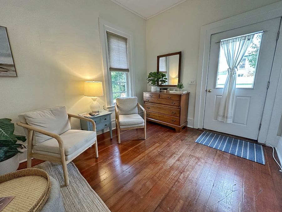 Sitting area to enjoy a good book and relax with your own private door to the pool in the summer months!
