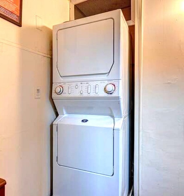 Washer and dryer outside unit, shared with another guest.