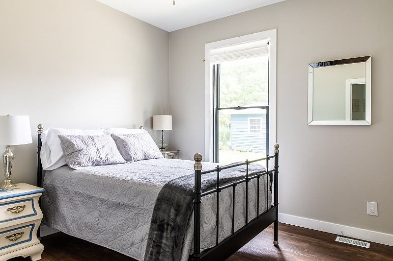 Bedroom 3 with full bed, closet, and blackout shades.