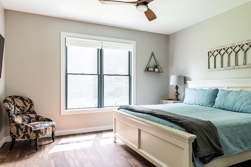 Master Bedroom with king size bed, Smart TV, large walk-in closet, blackout shades, and en suite Master Bath.