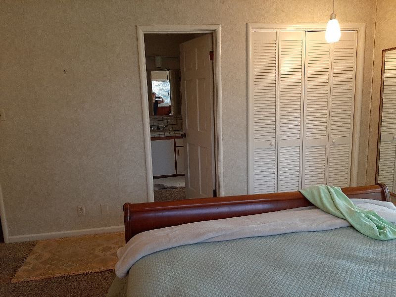 Door to master dressing room and bath