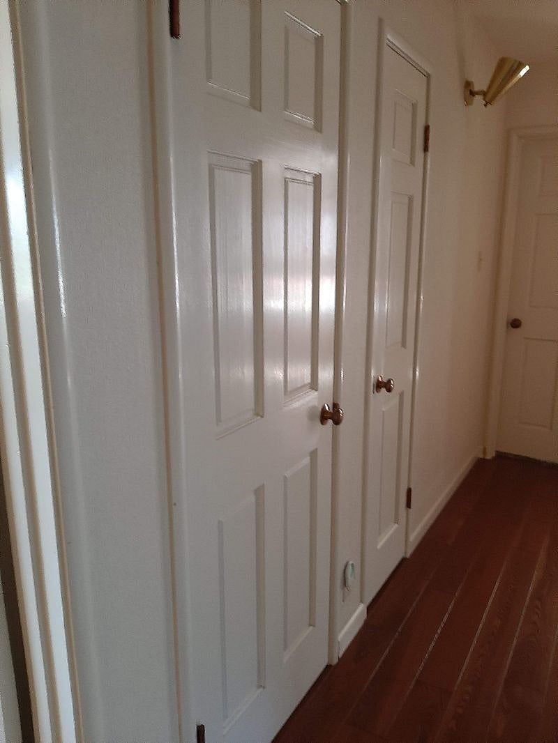 Hallway between bedrooms and closets. 