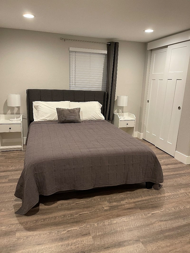 Bedroom 1- Queen bed, nightstands, blackout curtain and large closet. Each bedroom has laundry basket, desk, chair & dresser.