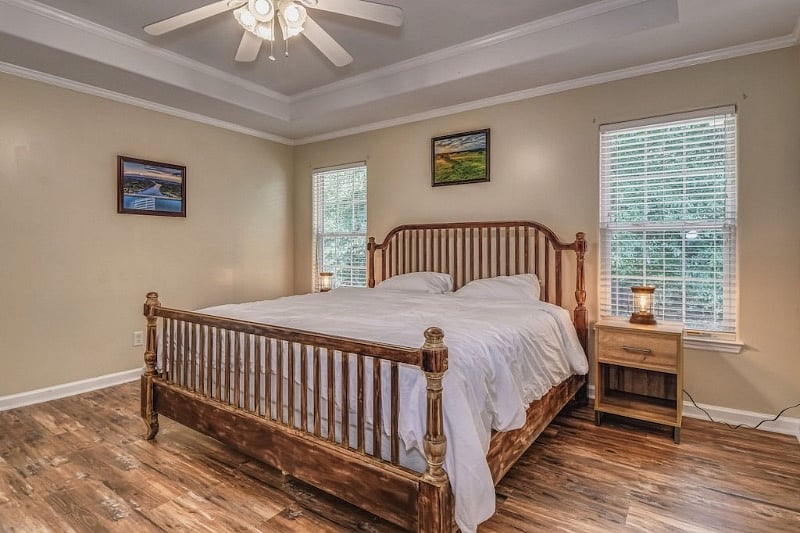 Master bedroom with king size bed.