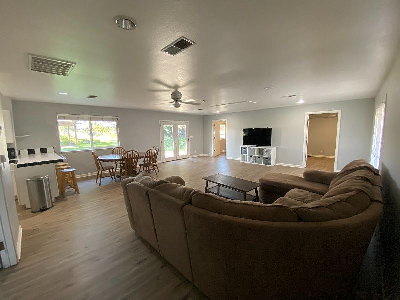 The living space is very large and open.  It features a flat screen TV equipped with an Amazon Fire Stick.