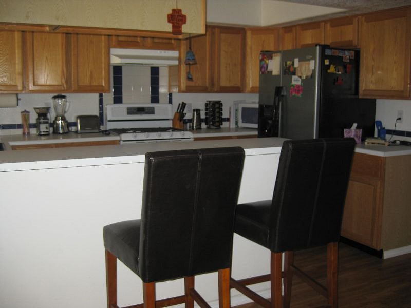 Fully equipped kitchen with all appliances: full fridge/freezer, dishwasher, microwave, regular coffee maker and Keurig.