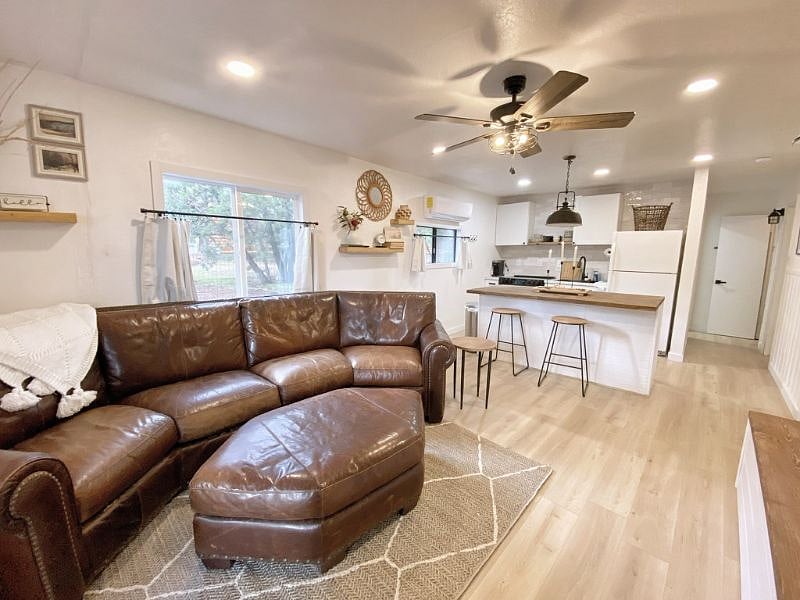 View from front door into living area. Lovely views with cafe curtains to provide privacy