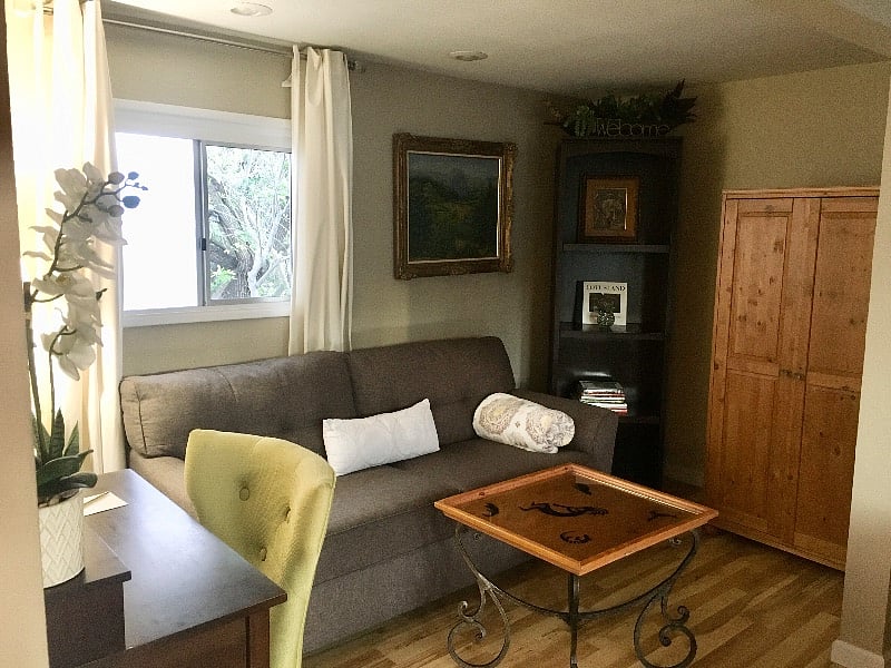There is a small closet, also there is room to hang things in the bathroom also.View of a garden in the back