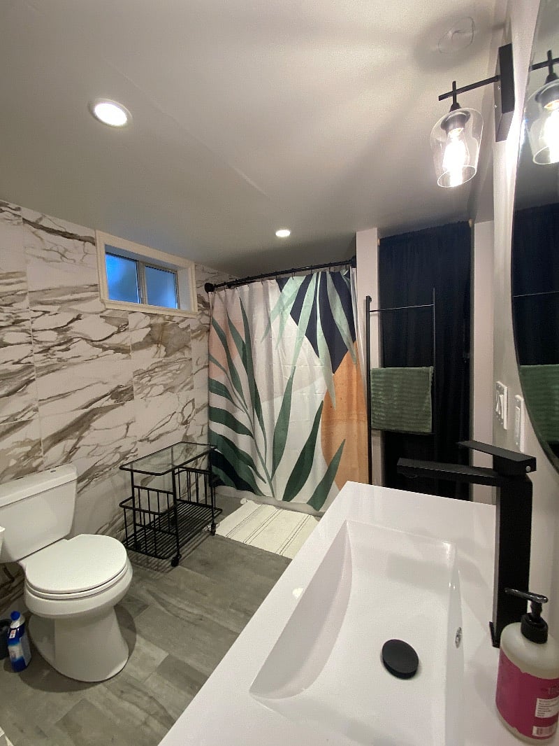 Full bath included heated floors, separate water heater, washer and dryer.