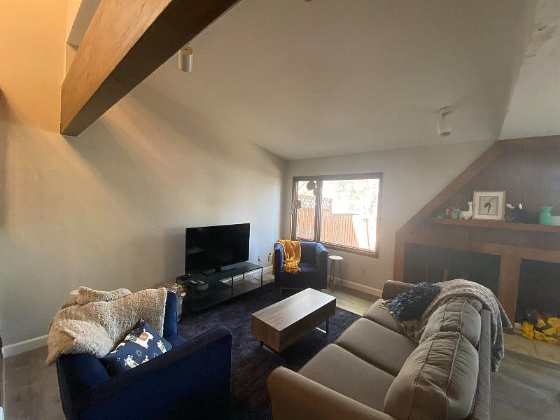 Living Room w/ woodburning fireplace