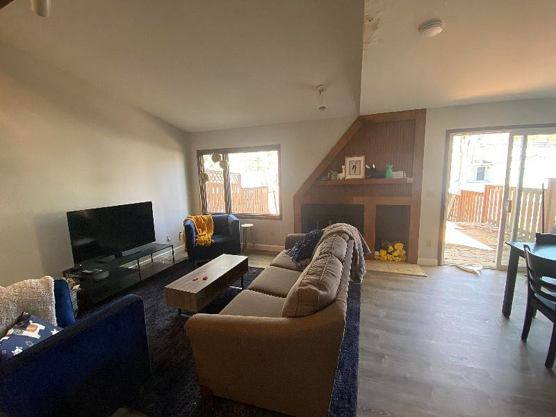 Living Room w/ woodburning fireplace