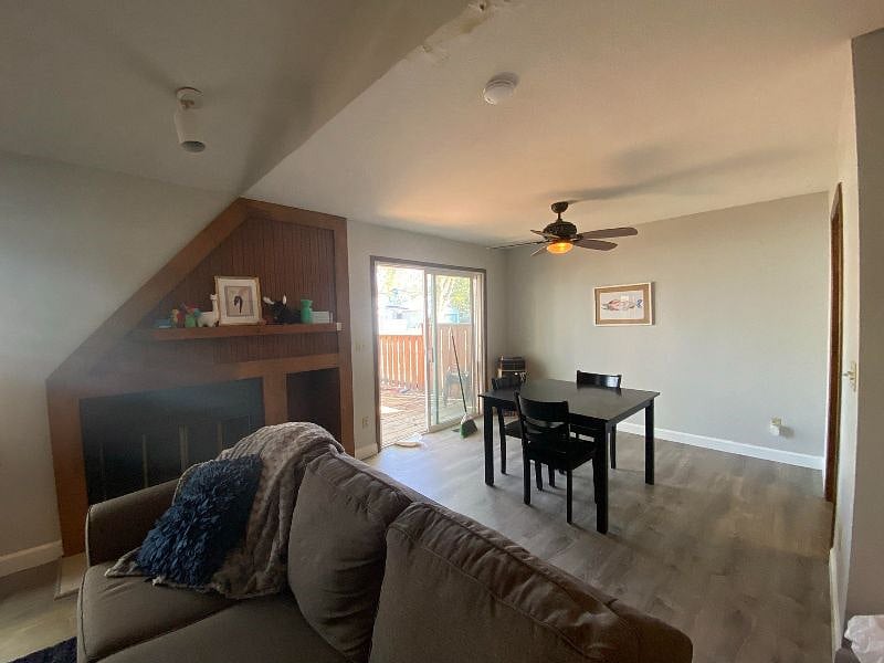 Living Room w/ woodburning fireplace