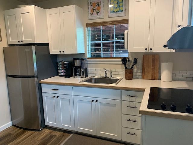 Kitchen area - features include Ninja 7 in 1 cooker, microwave, blender, coffee maker, Keurig, electric kettle, etc. 