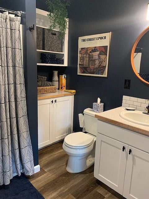 Bathroom with large shower and lots of storage. 